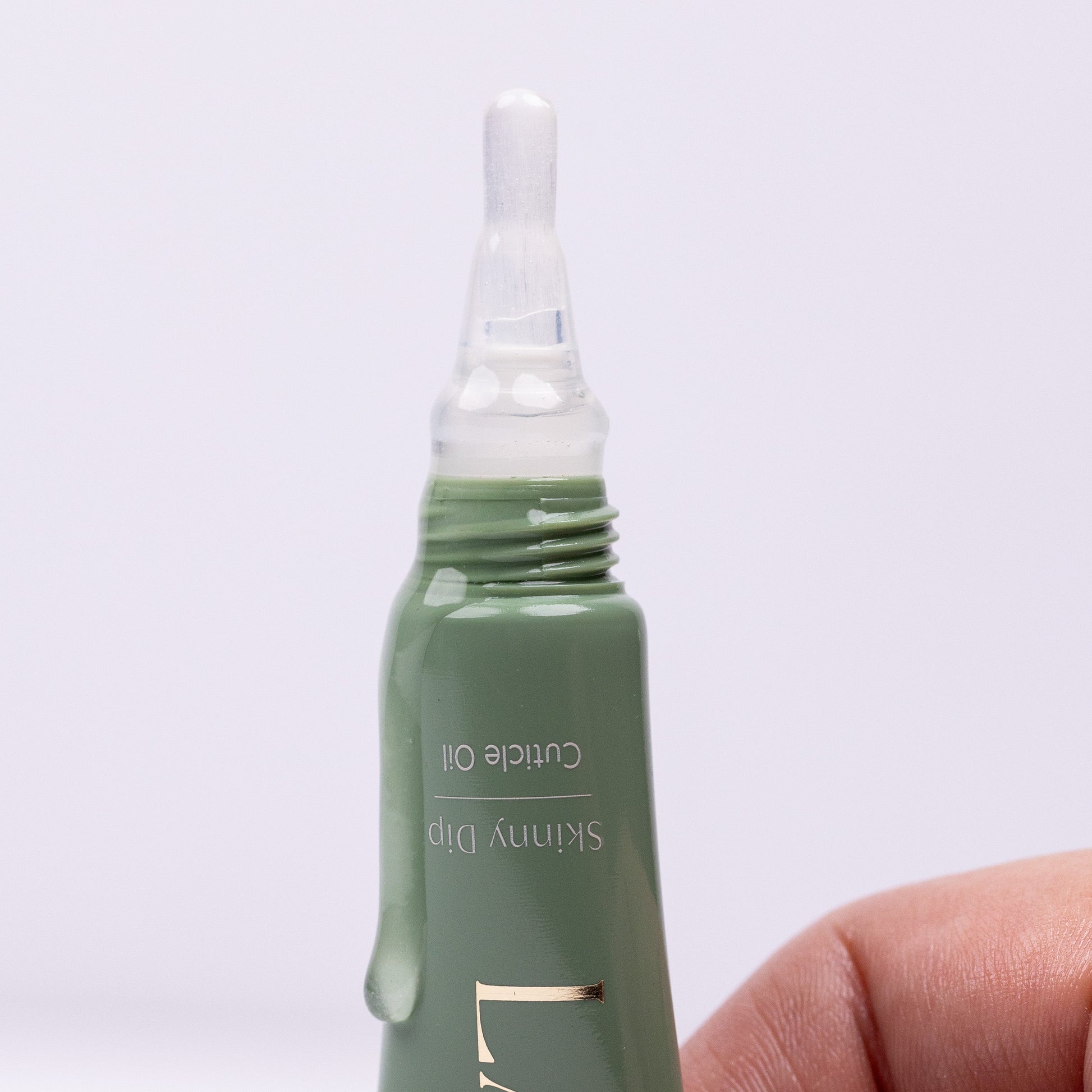 La Nin cuticle oil application on nails